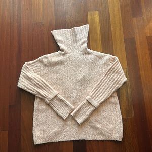 Size XS pink turtleneck sweater. New with tags.